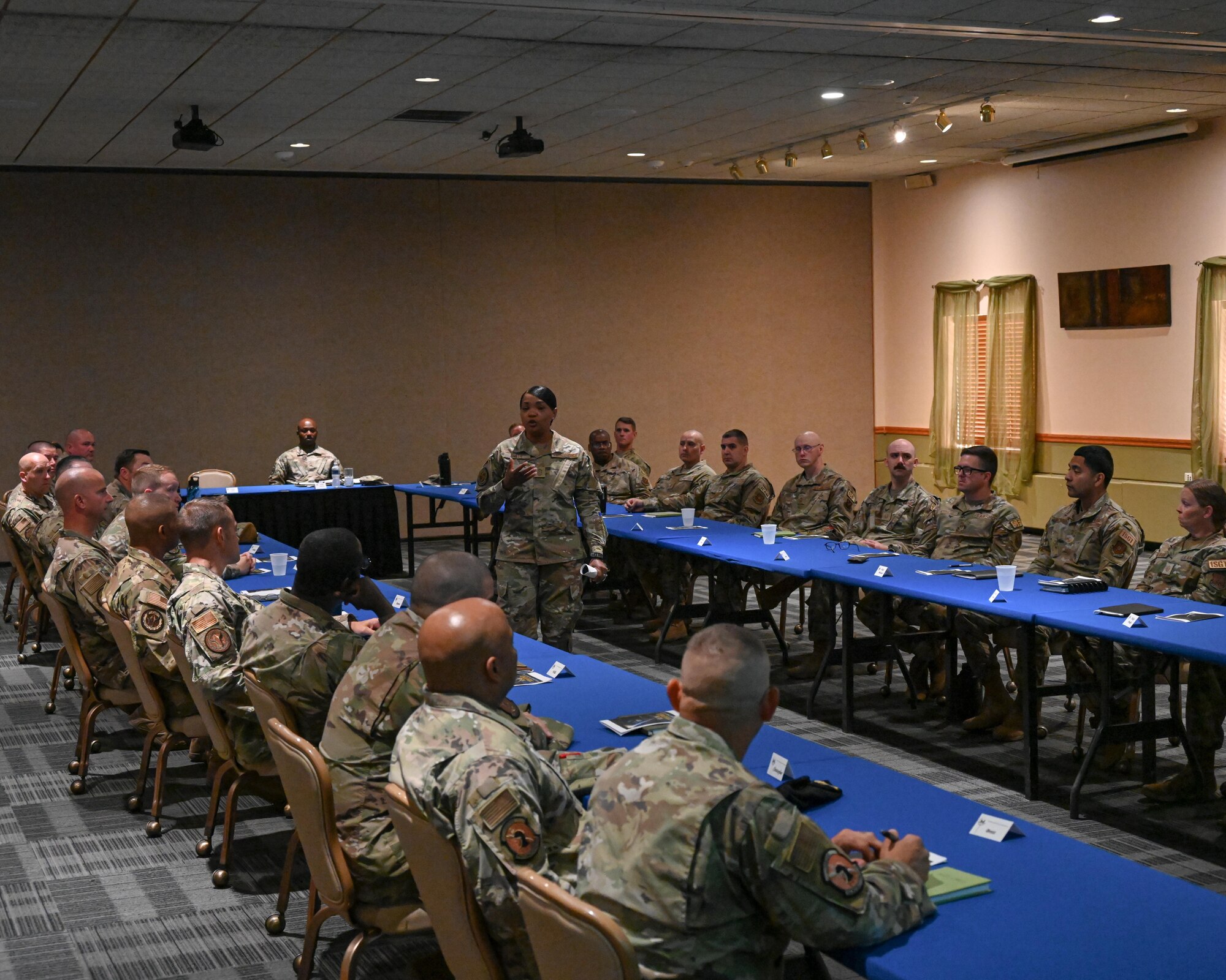 Chief Master Sgt. Melvina Smith, Air Force Global Strike command chief, speaks to group chiefs and first sergeants Friday June 13, 2023 at Minot Air Force Base, North Dakota. Smith is the senior enlisted leader responsible to the commander on matters concerning the welfare of the command’s Airmen, which includes 33,700 professionals operating at two Numbered Air Forces and eleven active duty, Air National Guard, and Air Force Reserve wings. (U.S. Air Force photo by Senior Airman Caleb S. Kimmell)