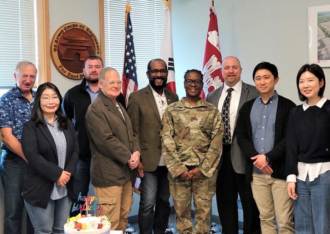 Maj. Priscilla Jewell (center), Safety and Occupational Health Management System (CESOHMS) champion for the U.S. Army Corps of Engineers, Far East District, poses with USACE CESOHMS assessment team and members of the district’s Safety team following FED’s Stage 3 assessment, April 24 to 26, 2023.  (US Army Photo by U.S. Army Corps of Engineers, Far East District)