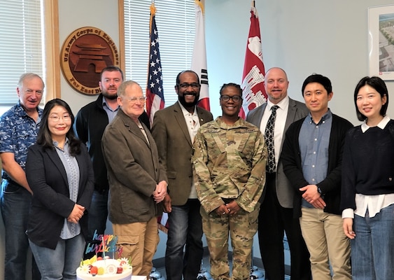 Maj. Priscilla Jewell (center), Safety and Occupational Health Management System (CESOHMS) champion for the U.S. Army Corps of Engineers, Far East District, poses with USACE CESOHMS assessment team and members of the district’s Safety team following FED’s Stage 3 assessment, April 24 to 26, 2023.  (US Army Photo by U.S. Army Corps of Engineers, Far East District)