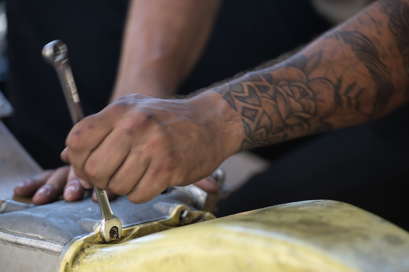 A U.S. Airman assigned to the 5th Maintenance Group performs routine maintenance on a U.S. Air Force B-52H Stratofortress assigned to the 23rd Expeditionary Bomb Squadron during a Bomber Task Force deployment at Andersen Air Force Base, Guam, July 9, 2023. BTF deployments like this enhance the readiness and training necessary to respond to any potential crisis or challenge across the globe. (U.S. Air Force photo by Tech. Sgt. Zade Vadnais)