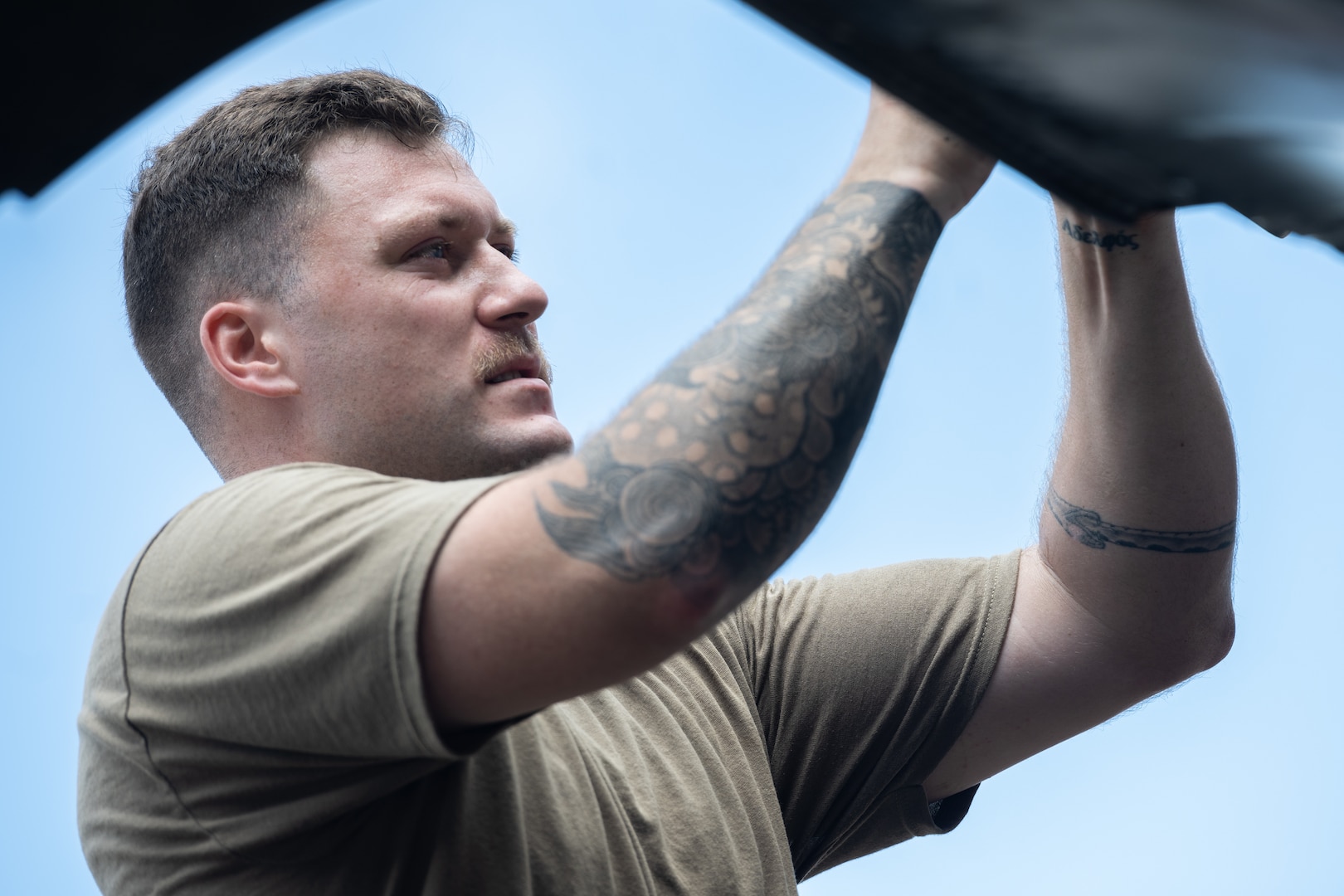 U.S. Air Force Staff Sgt. James Faulkner, 5th Aircraft Maintenance Squadron avionics specialist, performs routine maintenance on a B-52H Stratofortress assigned to the 23rd Expeditionary Bomb Squadron during a Bomber Task Force deployment at Andersen Air Force Base, Guam, July 9, 2023. Dedicated U.S. Strategic Command Airmen like Faulkner allow the command to execute its operations and provide the nation with its strategic deterrent against threats in all domains. (U.S. Air Force photo by Tech. Sgt. Zade Vadnais)