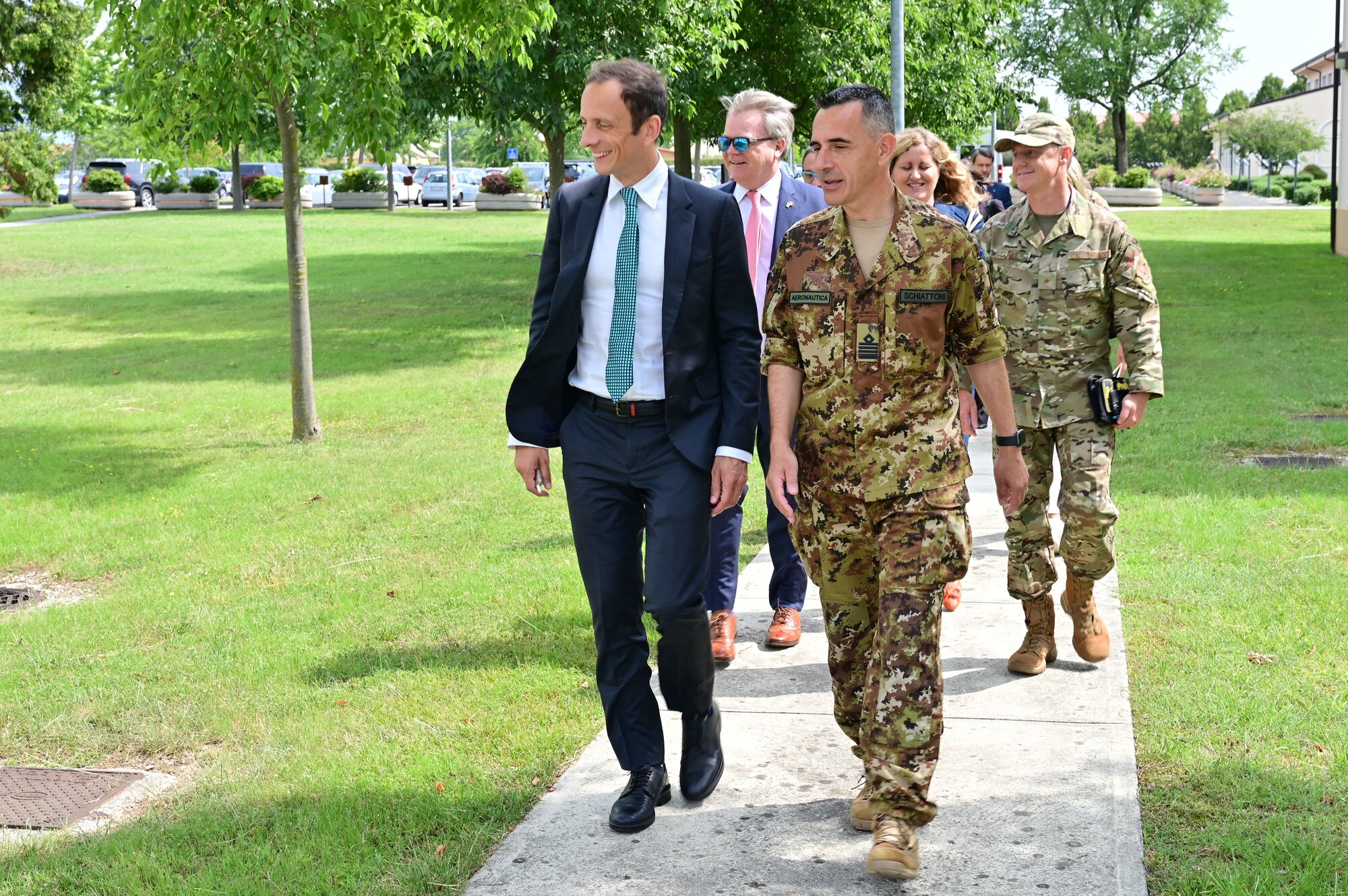 a group of people walking together during a base tour
