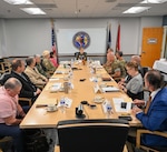 Maj. Gen. Jeannie Leavitt, Department of the Air Force Chief of Safety and Commander, Air Force Safety Center, center, leads a discussion during a Joint Safety Council meeting at the Naval Safety Command.