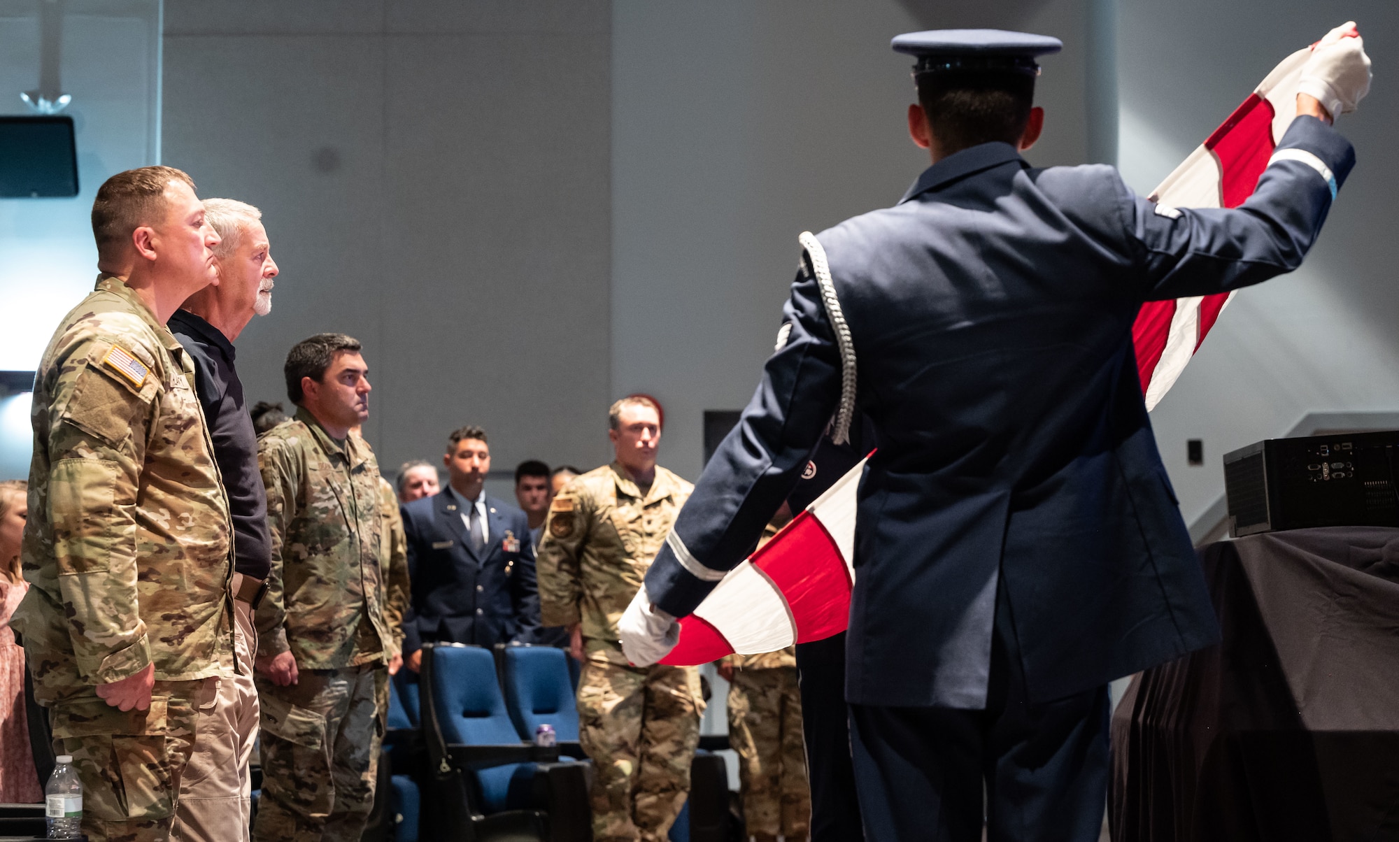 Dover Air Force Base Honor Guard members table top the U.S. flag during a memorial ceremony for Military Working Dog Jake OX14 at Dover Air Force Base, Delaware, July 10, 2023. The 436th SFS held the memorial ceremony in hopes of providing closure to retired U.S. Air Force Staff Sgt. Mark Smoot, MWD Jake’s handler, during their deployment to Vietnam in 1971. (U.S. Air Force photo by Airman 1st Class Dieondiere Jefferies)