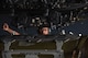 U.S. Air Force Staff Sergeant Tony Rodgers, 5th Aircraft Maintenance Squadron load crew member, signals to his team at Minot Air Force Base, North Dakota, June 14, 2023. Rodgers instructed his crew while loading an inert precision guided munition onto a B-52H Stratofortress. (U.S. Air Force photo by Airman 1st Class Kyle Wilson)