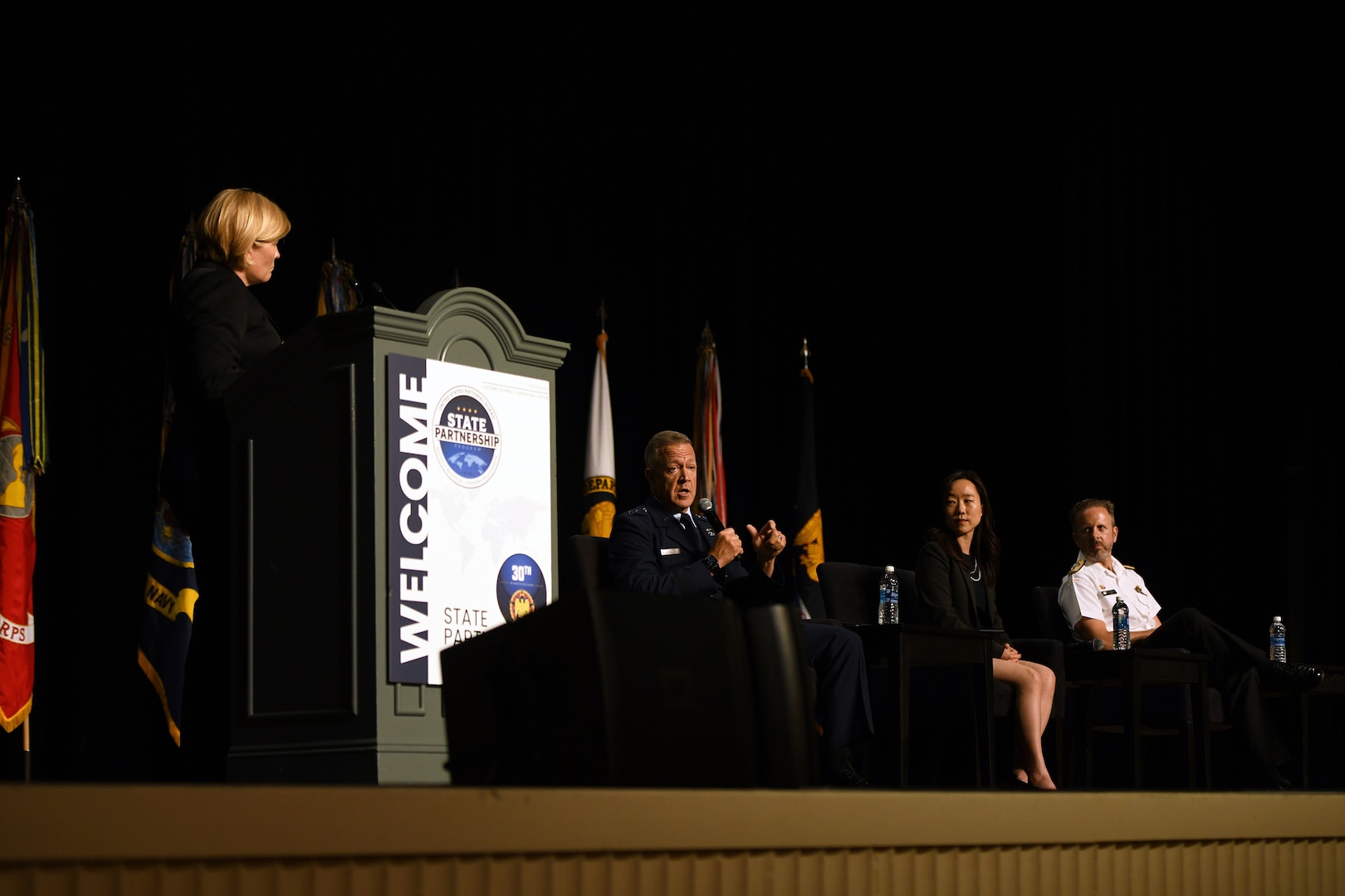 Air Force Maj. Gen. Richard Neely, the adjutant general of the Illinois National Guard, illustrates a point during a panel discussing cyber and information warfare at the Department of Defense National Guard State Partnership Program 30th Anniversary Conference at National Harbor, Maryland, July 18, 2023.
