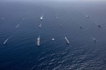 Ships and Aircraft participating in UNITAS 23 steam into formation in the Caribbean Sea, July 16, 2023.