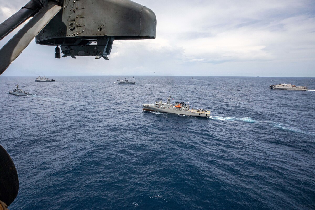Ships and Aircraft participating in UNITAS 23 steam into formation in the Caribbean Sea, July 16, 2023.