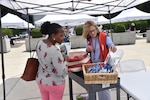 American Red Cross volunteer shares information during Safety Day Celebration 2023.