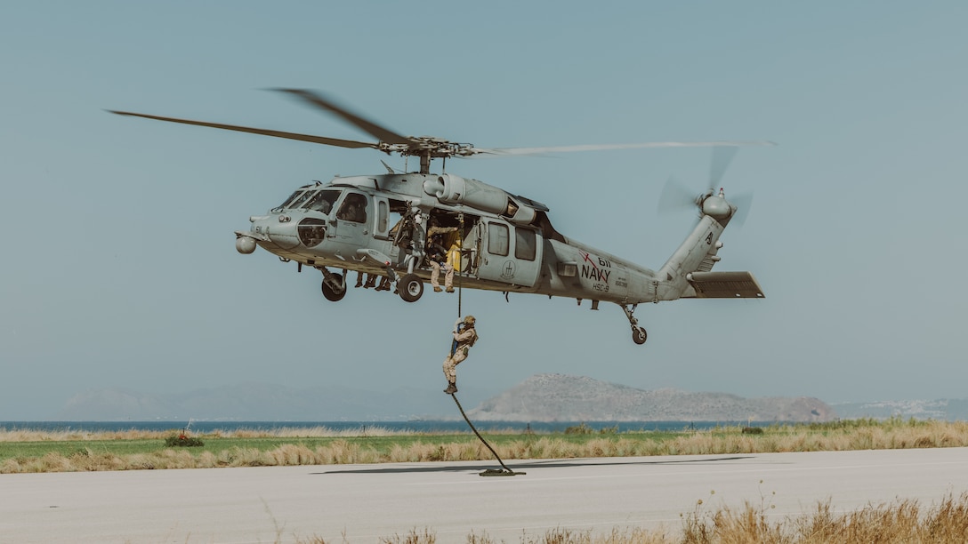U.S. Marines with Force Company, 2d Reconnaissance Battalion, 2d Marine Division, under tactical control of Task Force 61/2, fast rope out of a MH-60S helicopter in Souda Bay, Greece on July 19, 2023. Task Force 61/2.5 provides naval and joint force commanders with dedicated multi-domain reconnaissance and counter reconnaissance capabilities.