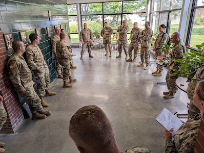 Vermont National Guard Soldiers and Airmen meet for a Liaison Officer briefing to discuss assignments related to the historic flooding in the state of Vermont at Camp Johnson, Colchester, Vermont, July 19, 2023.