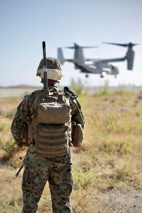 A radio operator watches as an osprey fly's away after successfully calling a medevac 9 line!