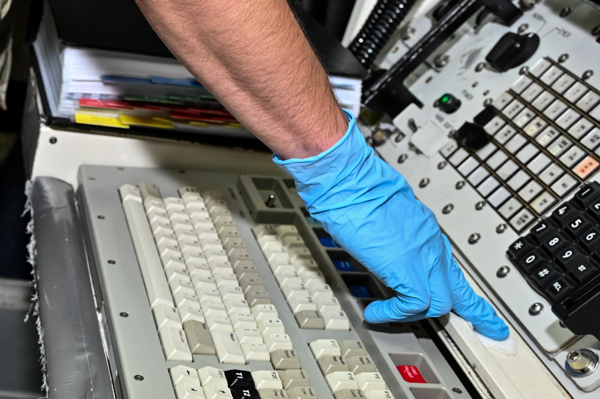 Airman 1st Class Mikhail Ayala, 90th Operational Medical Readiness Squadron bioenvironmental engineering apprentice, takes samples at L-01 missile alert facility, or MAF, near Stoneham, Colorado, July 13, 2023. USAFSAM teams visited all of F.E. Warren Air Force Base’s MAFs as part of the ongoing missile community cancer study at all three intercontinental ballistic missile wings in Air Force Global Strike Command. While there, the teams assessed indoor air quality at each facility to include temperature, humidity, carbon dioxide and carbon monoxide levels. They also collected water and soil samples and tested for the presence of radon, polychlorinated biphenyls, organic phosphates and other potential occupational exposure hazards. USAFSAM is part of the Air Force Research Laboratory’s 711th Human Performance Wing. (U.S. Air Force photo by Joseph Coslett Jr.)