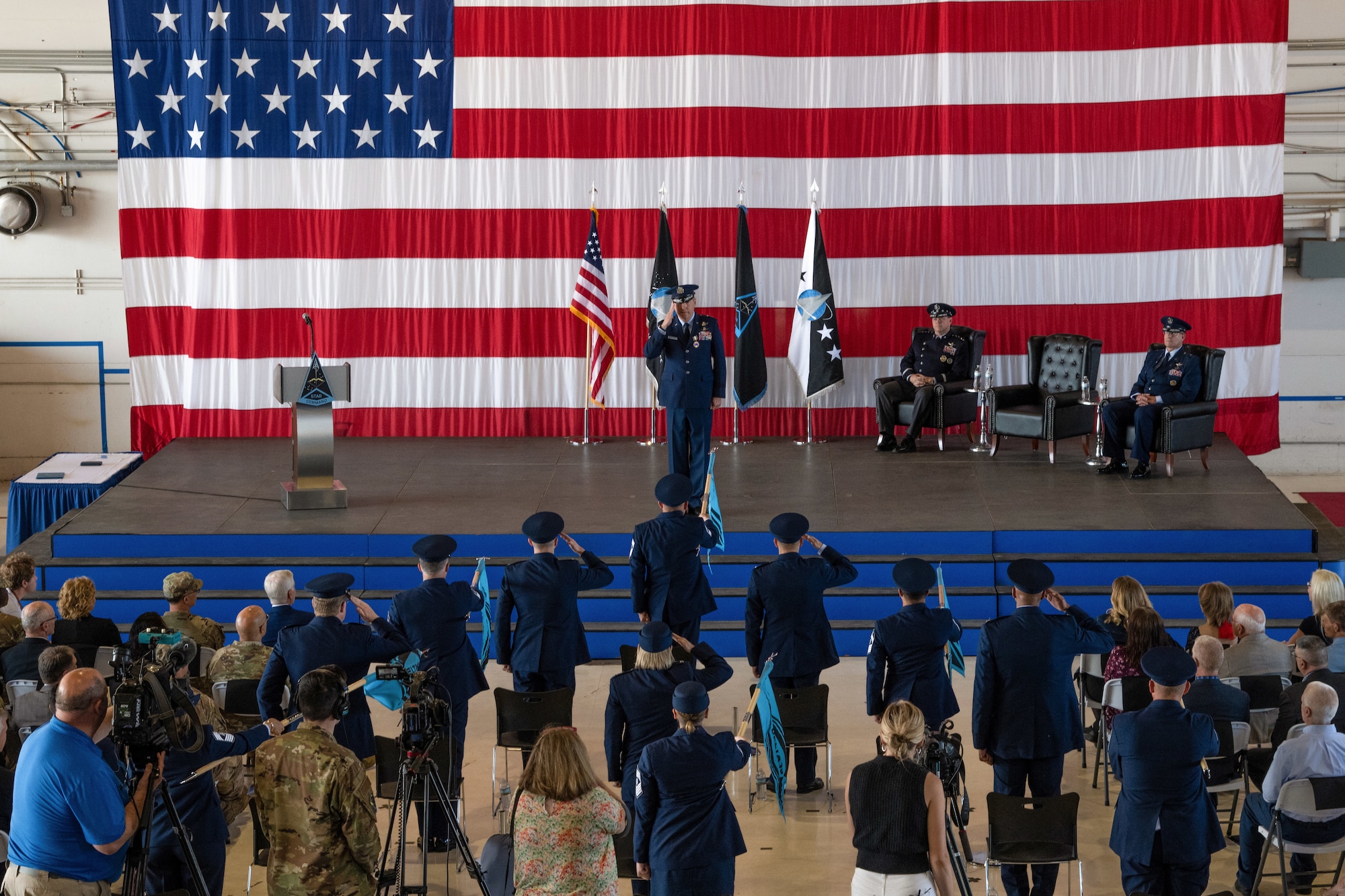 U.S. Air Force Maj. Gen. Shawn N. Bratton, Space Training and Readiness Command (STARCOM) outgoing commander, center, renders a final salute to the Guardians of STARCOM during a change of command ceremony at Peterson Space Force Base, Colorado, July 20, 2023. Bratton relinquished command to U.S. Space Force Brig. Gen. Timothy A. Sejba during the ceremony.  (U.S. Space Force photo by Senior Airman Brooke Wise)