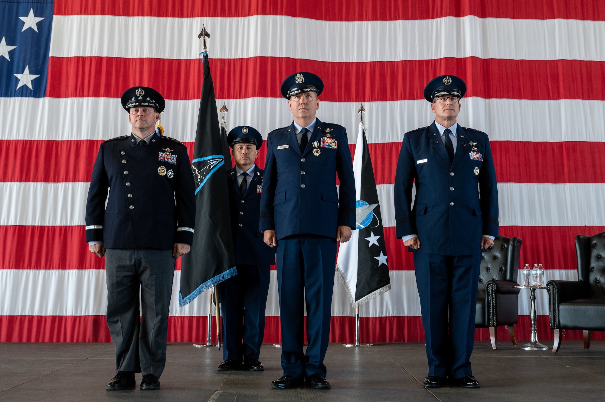 Space Training and Readiness Command holds a change of command ceremony at Peterson Space Force Base, Colorado, July 20, 2023. During the ceremony, U.S. Air Force Maj. Gen. Shawn N. Bratton, center, relinquished command to U.S. Space Force Brig. Gen. Timothy A. Sejba, right.  (U.S. Space Force photo by Ethan Johnson)