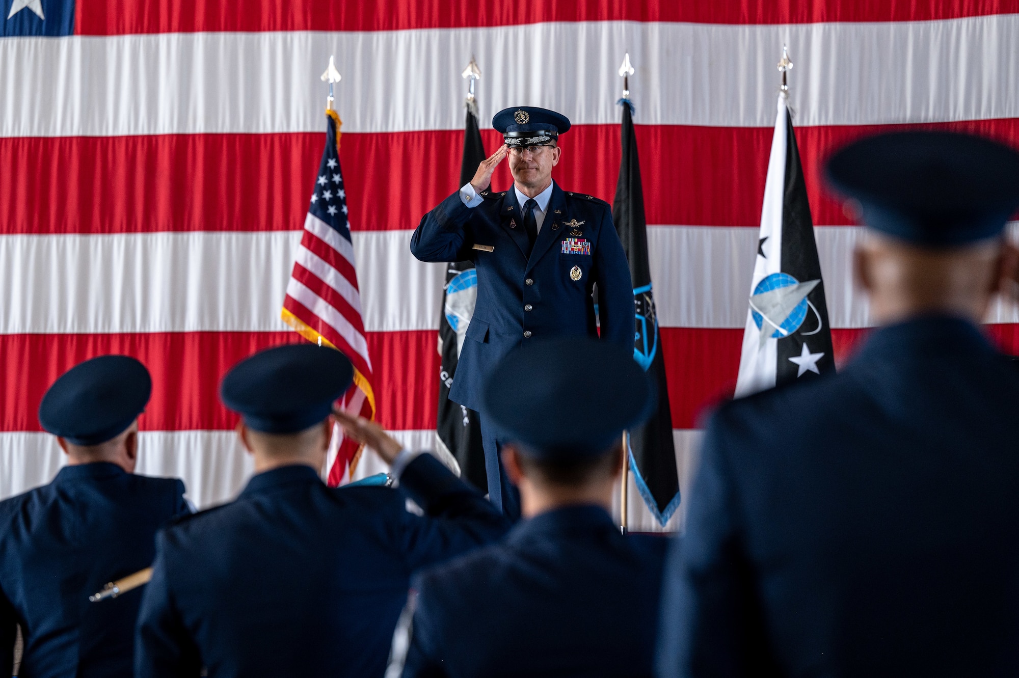 U.S. Space Force Brig. Gen. Timothy A. Sejba, Space Training and Readiness Command (STARCOM) incoming commander, renders his first salute to the Guardians of STARCOM during STARCOM’s change of command ceremony at Peterson Space Force Base, Colorado, July 20, 2023. Sejba assumed command from U.S. Air Force Maj. Gen. Shawn N. Bratton during the ceremony. (U.S. Space Force photo by Ethan Johnson)
