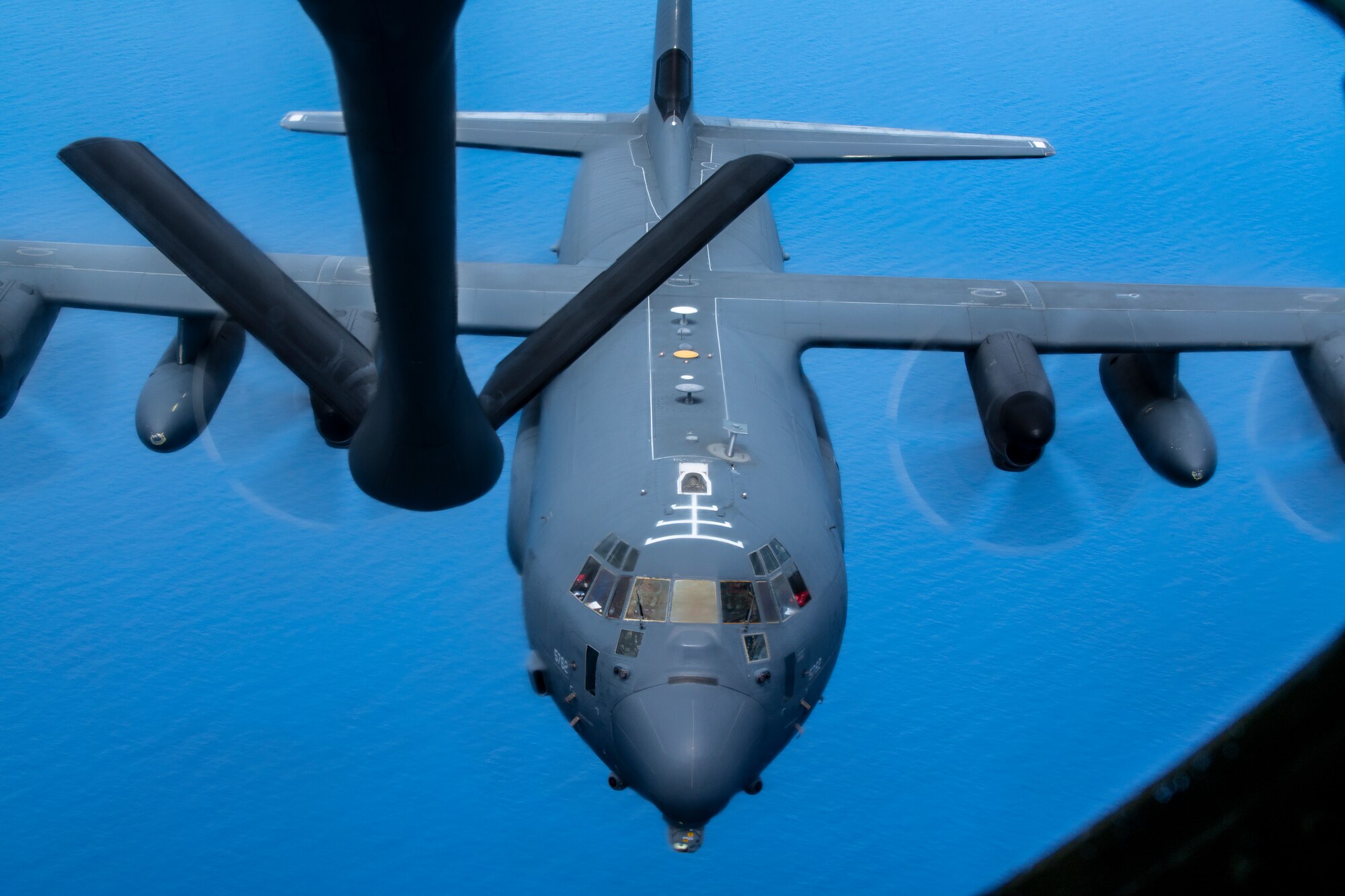 A U.S. Air Force MC-130J Commando II aircraft assigned to the 1st Special Operations Squadron approaches a KC-135 Stratotanker from the 909th Air Refueling Squadron to receive fuel over the Pacific Ocean, July 19, 2023.