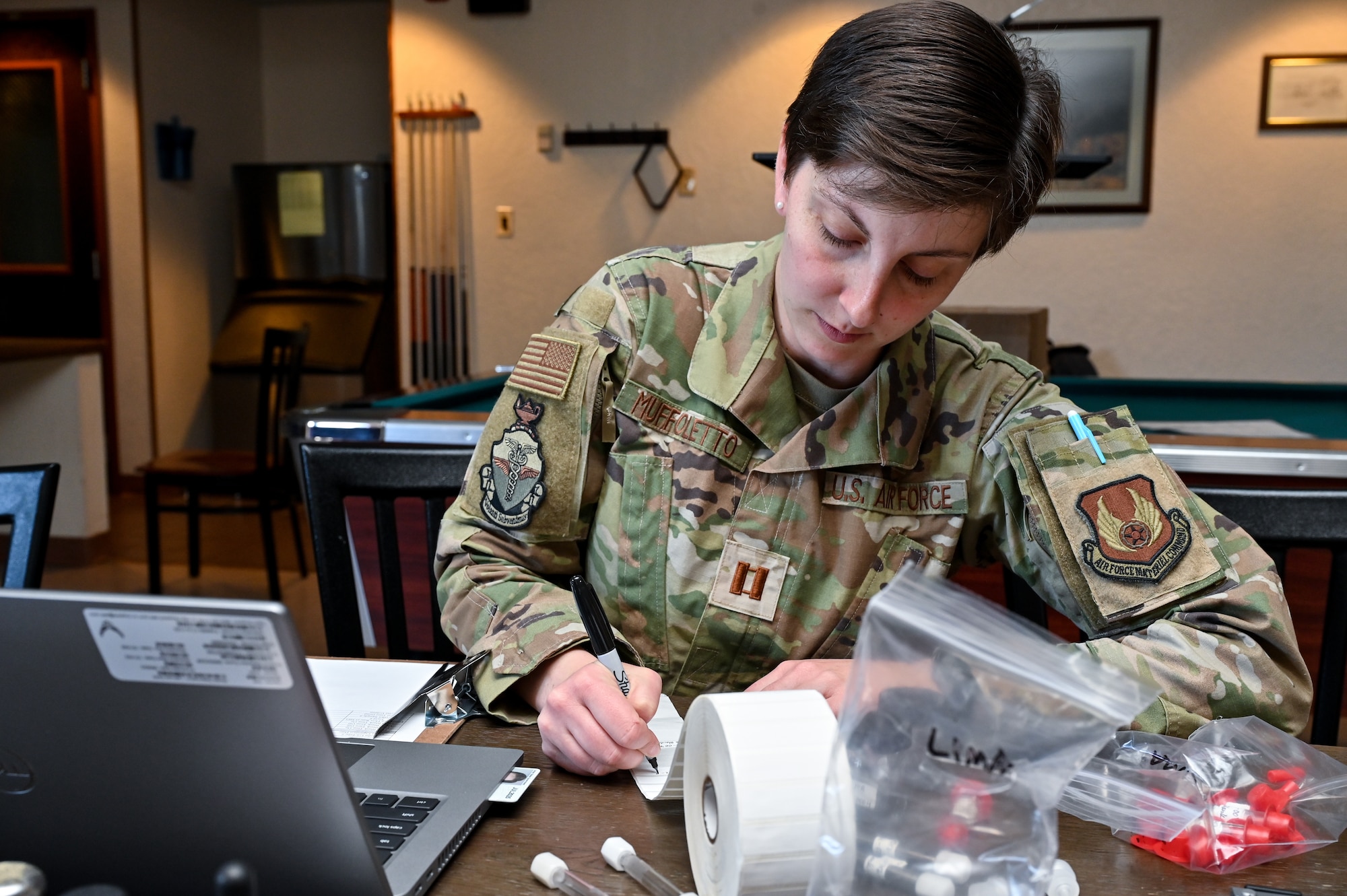 Capt. Isabella Muffoletto, U.S. Air Force School of Aerospace Medicine bioenvironmental engineer, labels different samples at L-01 missile alert facility, or MAF, near Stoneham, Colorado, July 13, 2023. USAFSAM teams visited all of F.E. Warren Air Force Base’s MAFs as part of the ongoing missile community cancer study at all three intercontinental ballistic missile wings in Air Force Global Strike Command. While there, the teams assessed indoor air quality at each facility to include temperature, humidity, carbon dioxide and carbon monoxide levels. They also collected water and soil samples and tested for the presence of radon, polychlorinated biphenyls, organic phosphates and other potential occupational exposure hazards. USAFSAM is part of the Air Force Research Laboratory’s 711th Human Performance Wing. (U.S. Air Force photo by Joseph Coslett Jr.)