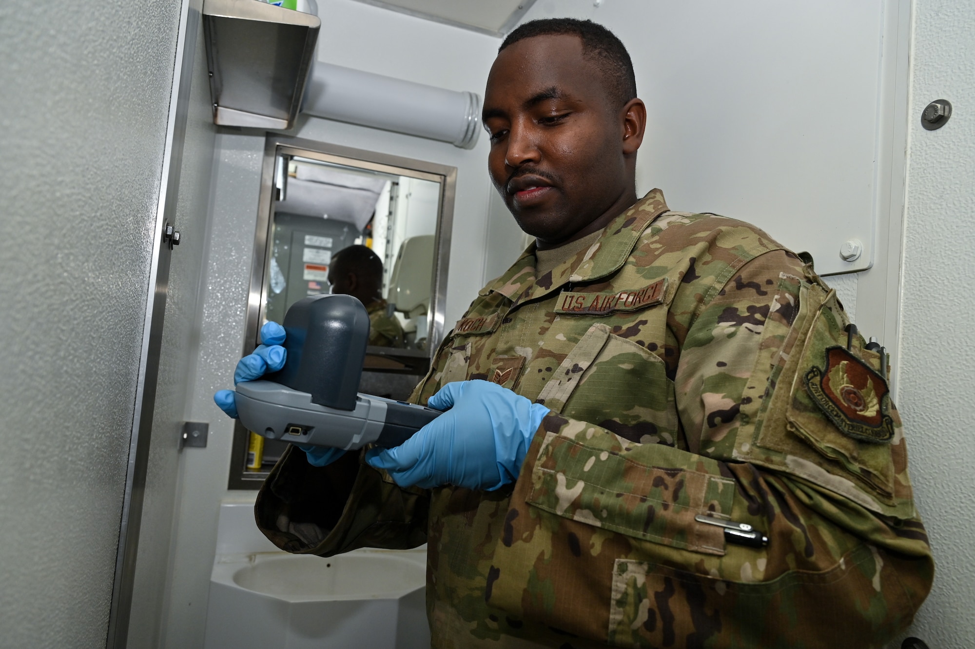 Staff Sgt. Enock Koech, U.S. Air Force School of Aerospace Medicine bioenvironmental engineer, takes samples at L-01 missile alert facility, or MAF, near Stoneham, Colorado, July 13, 2023. USAFSAM teams visited all of F.E. Warren Air Force Base’s MAFs as part of the ongoing missile community cancer study at all three intercontinental ballistic missile wings in Air Force Global Strike Command. While there, the teams assessed indoor air quality at each facility to include temperature, humidity, carbon dioxide and carbon monoxide levels. They also collected water and soil samples and tested for the presence of radon, polychlorinated biphenyls, organic phosphates and other potential occupational exposure hazards. USAFSAM is part of the Air Force Research Laboratory’s 711th Human Performance Wing. (U.S. Air Force photo by Joseph Coslett Jr.)