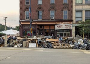 Piles of debris stacked up outside the Savoy Theatre after historic flooding in Montpelier, VT, July 18, 2023.