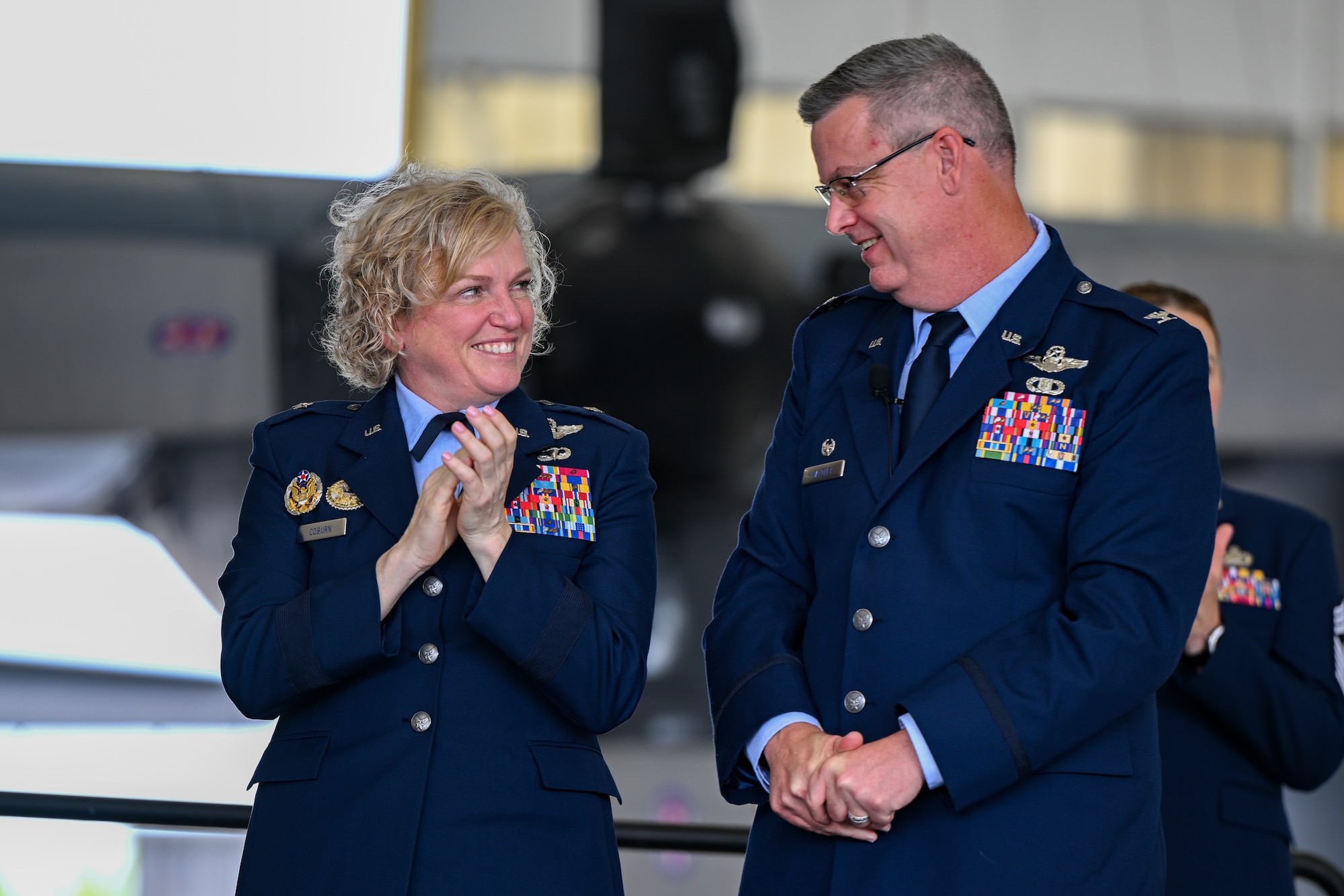 Brig. Gen. Melissa Coburn, 22nd Air Force commander, shares a few words with Col. Michael Maloney, 910th Airlift Wing commander, during his assumption of command ceremony, July 15, 2023, at Youngstown Air Reserve Station, Ohio.