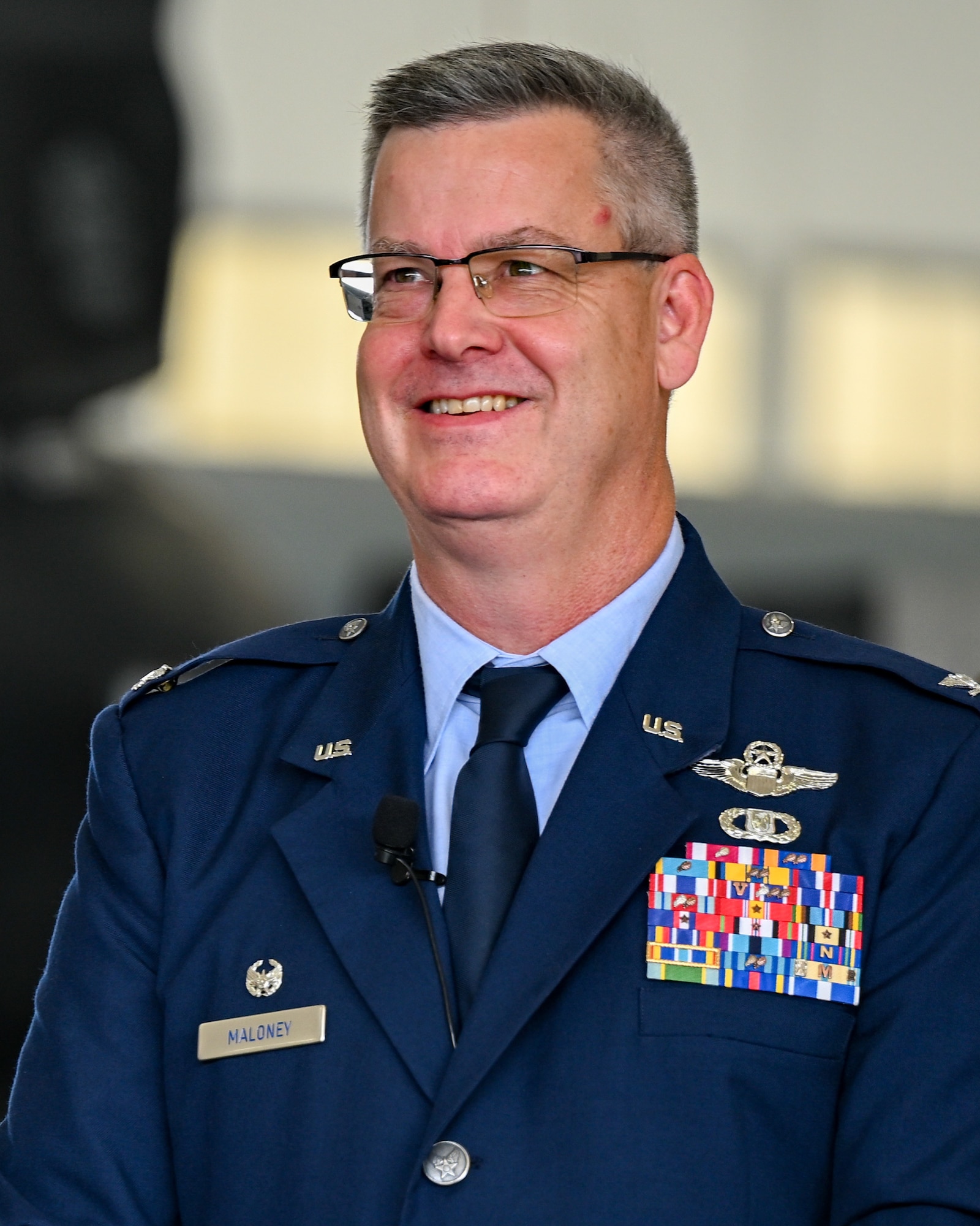 Col. Michael Maloney, 910th Airlift Wing commander, smiles during his assumption of command ceremony at Youngstown Air Reserve Station, Ohio, July 15, 2023.