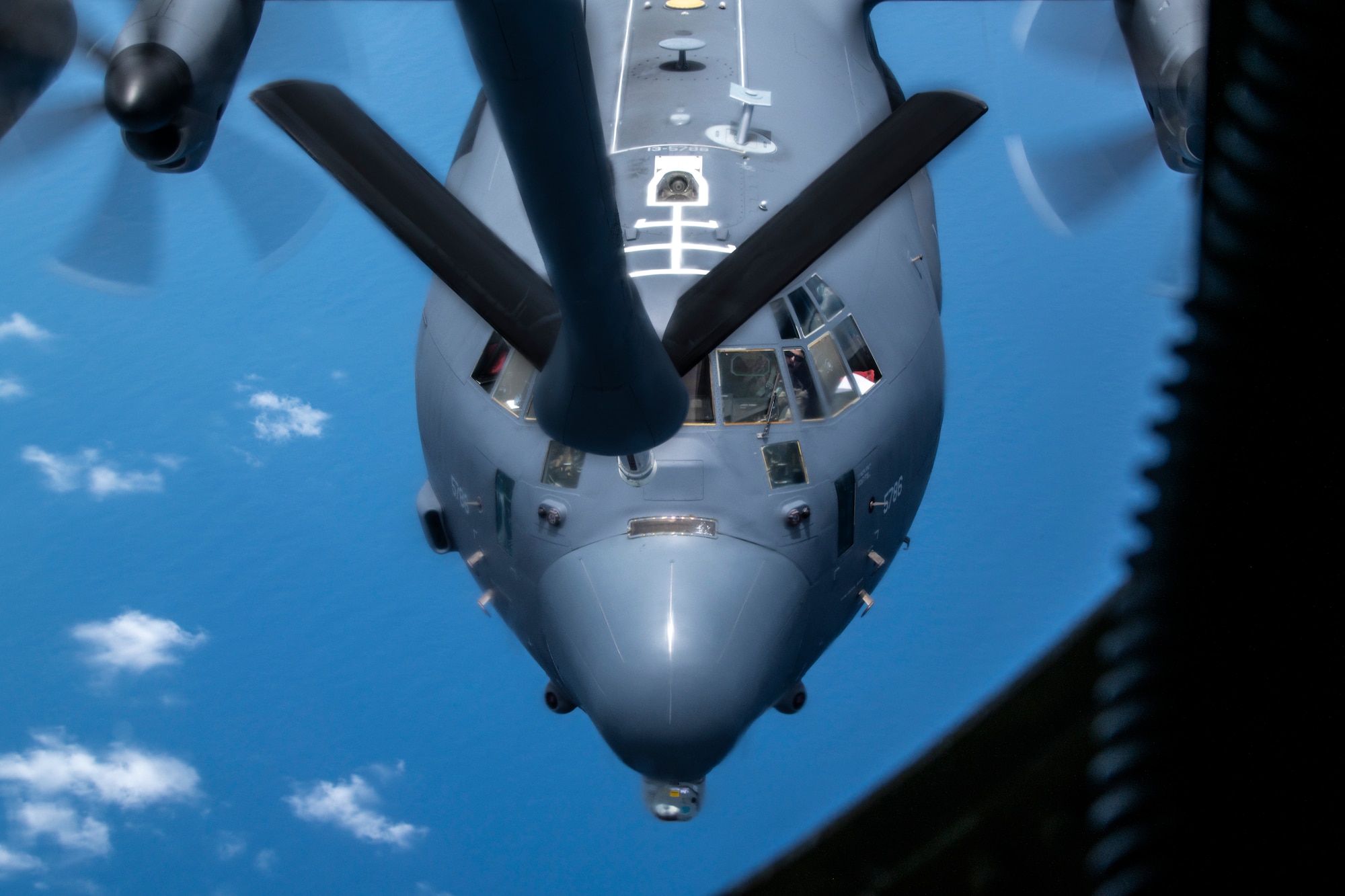 A U.S. Air Force MC-130J Commando II aircraft assigned to the 1st Special Operations Squadron approaches a KC-135 Stratotanker from the 909th Air Refueling Squadron to receive fuel over the Pacific Ocean, July 19, 2023.