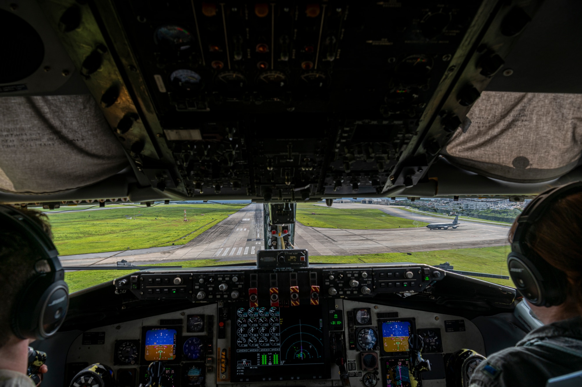 U.S. Air Force Capt. James Bradford, 909th Air Refueling Squadron aircraft commander, and 1st Lt. Arica Snodgrass, 909th ARS pilot, prepare to land a KC-135 Stratotanker at Kadena Air Base, Japan, July 19, 2023.