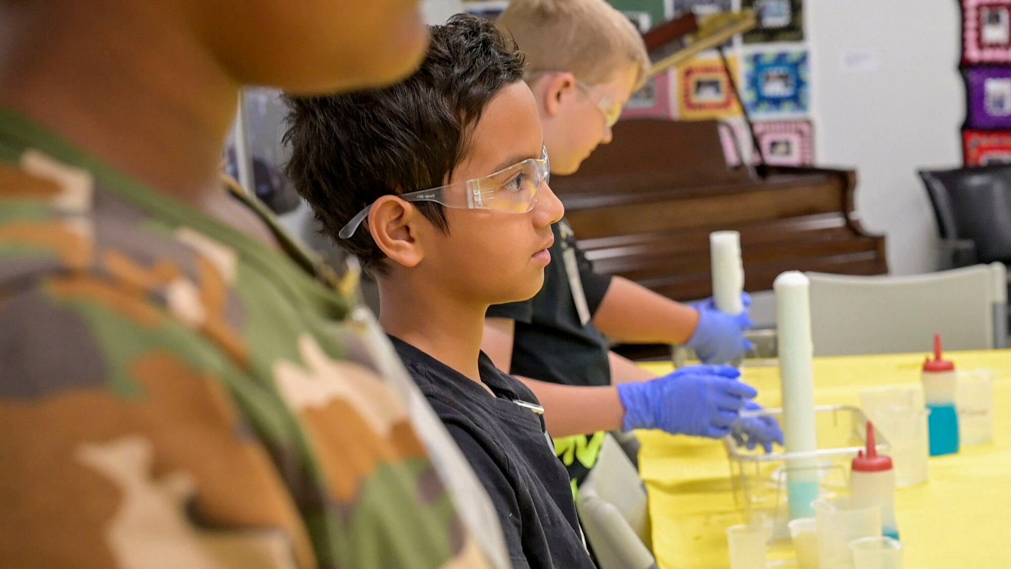 A STARBASE Edwards student participates in "Bubble Trouble" a STEM activity designed to teach kids about science. STARBASE is a Department of Defense program designed to engage and immerse students in the world of science, technology, engineering and math.