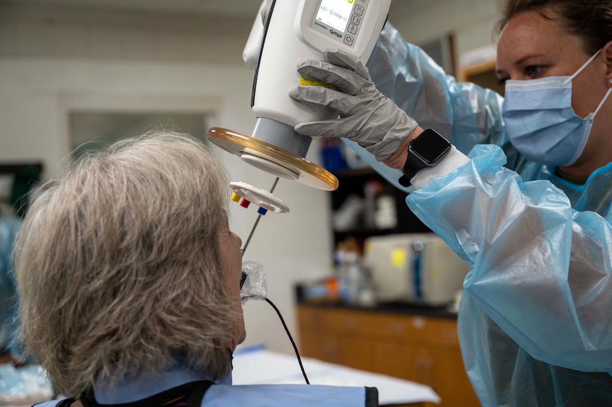 Photo of person receiving a dental x-ray.