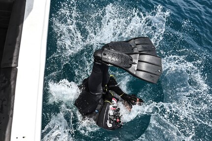 A Colombian Diver enters the water during multinational diving operations with Mobile Diving and Salvage Unit 2 (MDSU 2) during UNITAS LXIV, July. 18, 2023.