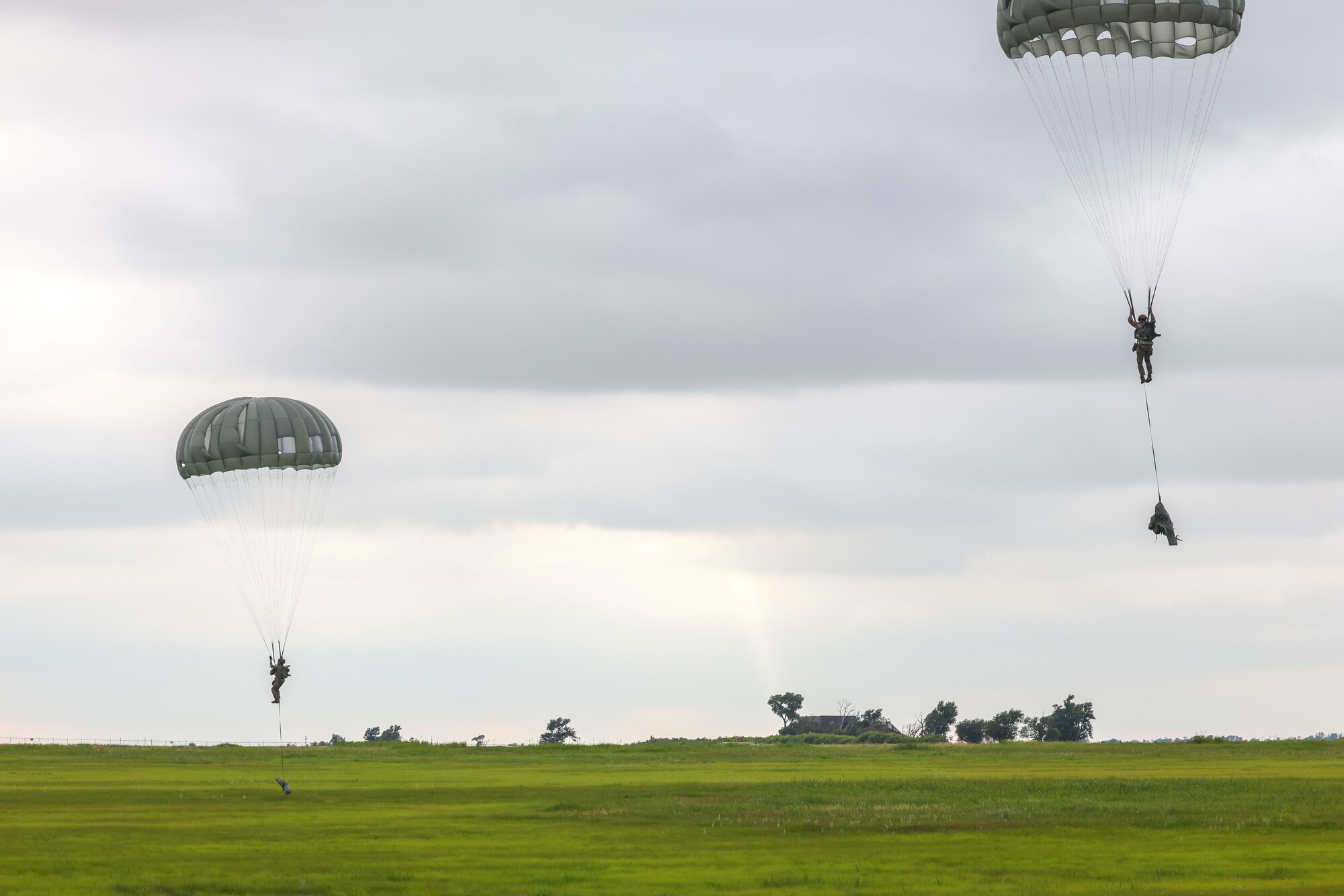 Airmen parachute