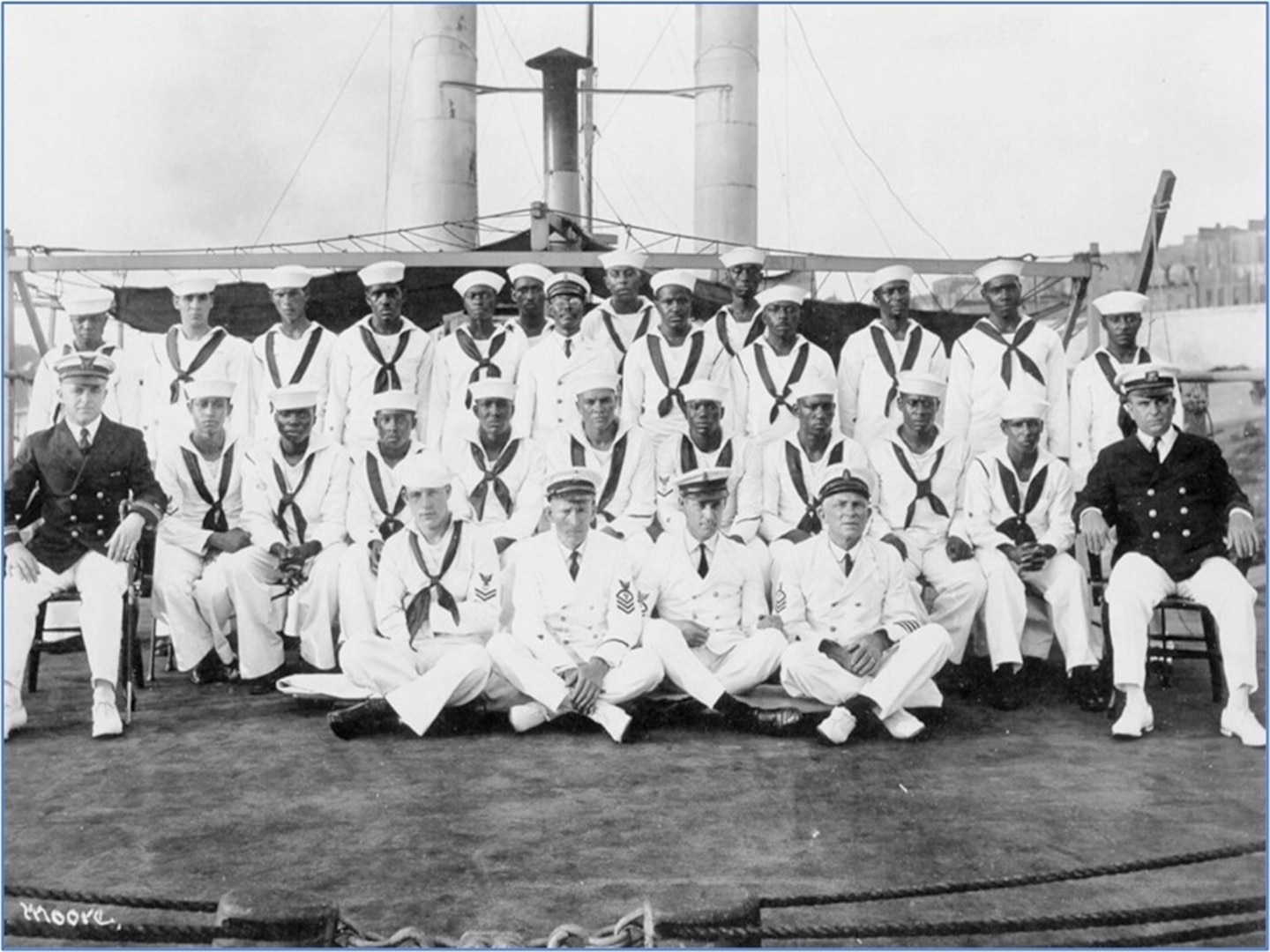 The mixed-race crew of African American enlisted men, with white officers and NCOs, on board cutter Yocona in 1919, at the time of the U.S. government’s segregation policy. (U.S. Coast Guard)