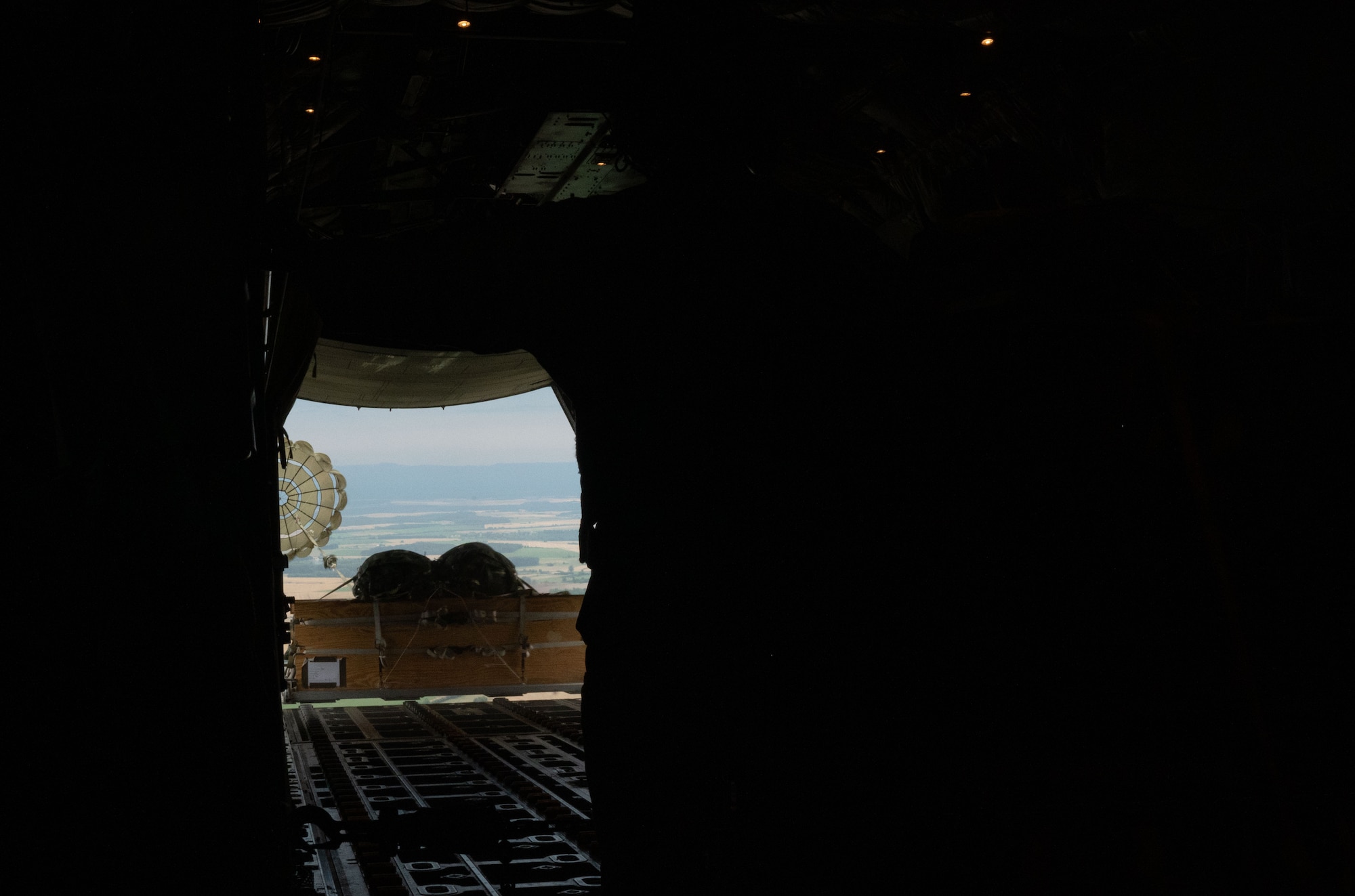 A cargo pallet falls out of a C-130
