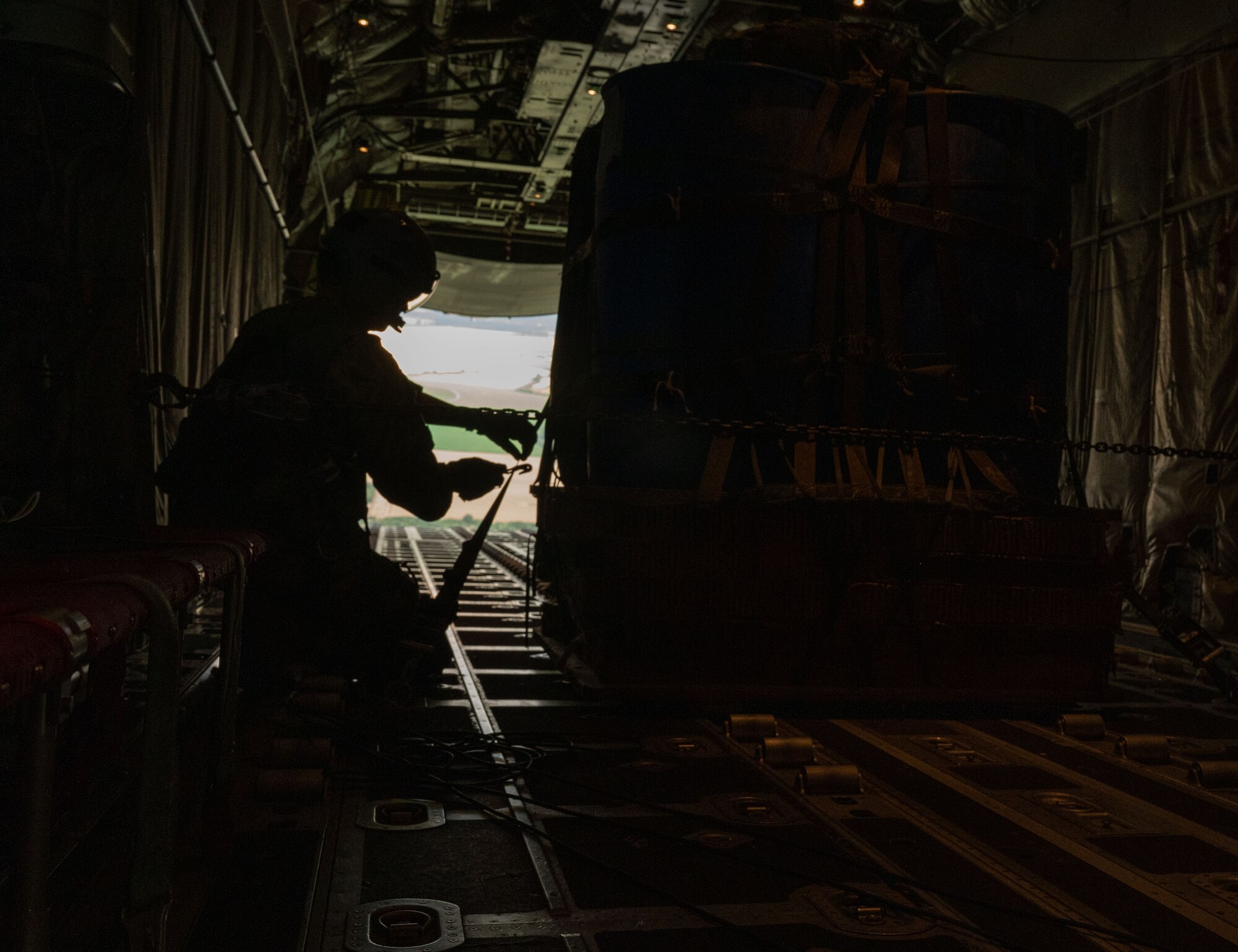 An Airman ties knots in a rope