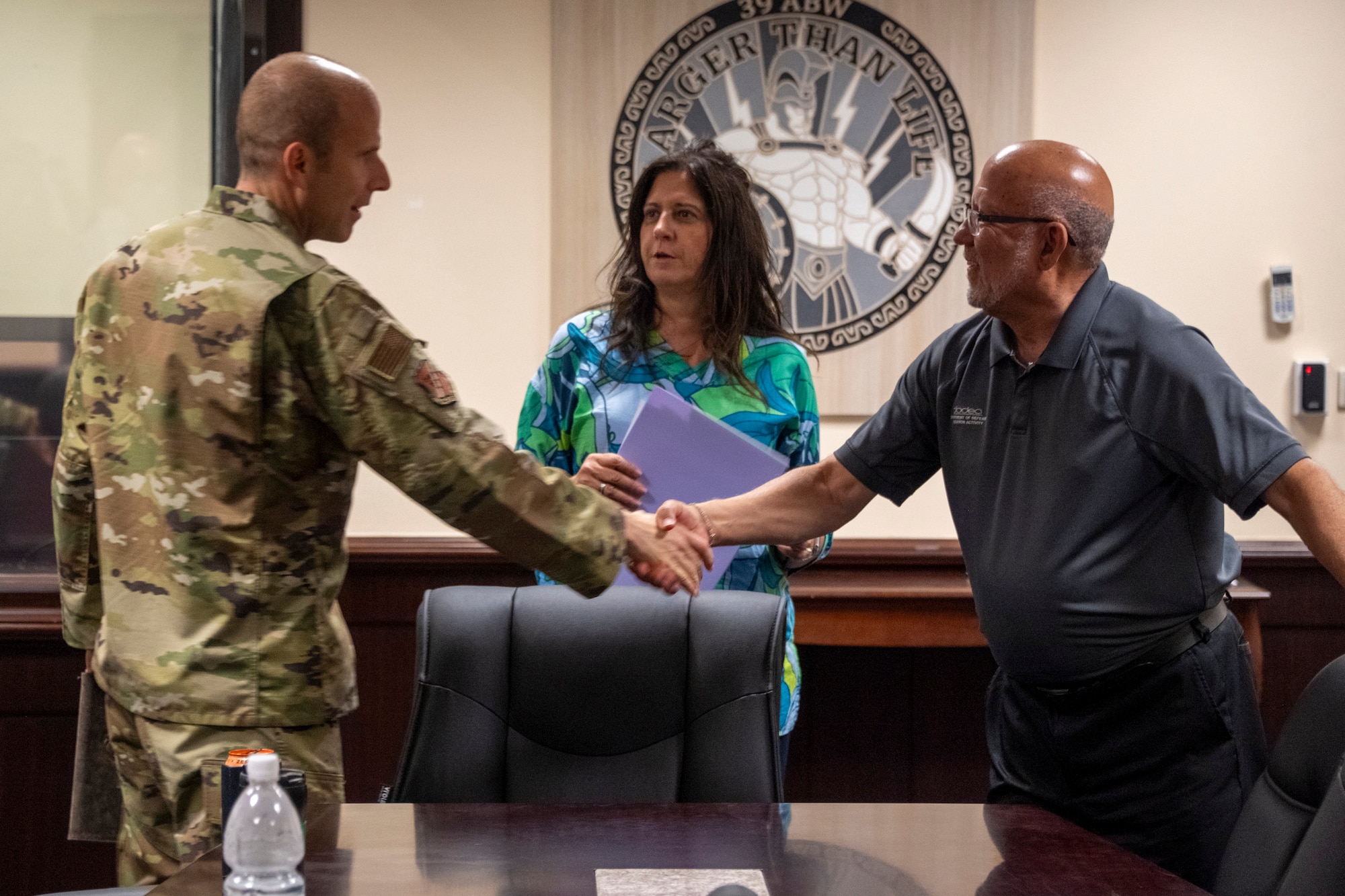 Col. Kevin M. Lord, 39th Air Base Wing commander, left, thanks Dr. Charles Keller, Department of Defense Education Activity Europe chief of staff, right, and Dr. Michelle Howard-Brahaney, Department of Defense Education Activity Europe director, middle, for visiting Incirlik Air Base, Türkiye, 18 July, 2023. The DoDEA-Europe leadership visited to assess the ability to reopen Incirlik AB to military families as well as the condition of the school buildings. Once assessed, DoDEA-Europe will create a budget and build a plan to pitch to leader at U.S. Air Forces in Europe. Incirlik AB has continued to work towards the possibility of having family members return to the base for the first time since 2016. (U.S. Air Force photo by Senior Airman David D. McLoney)