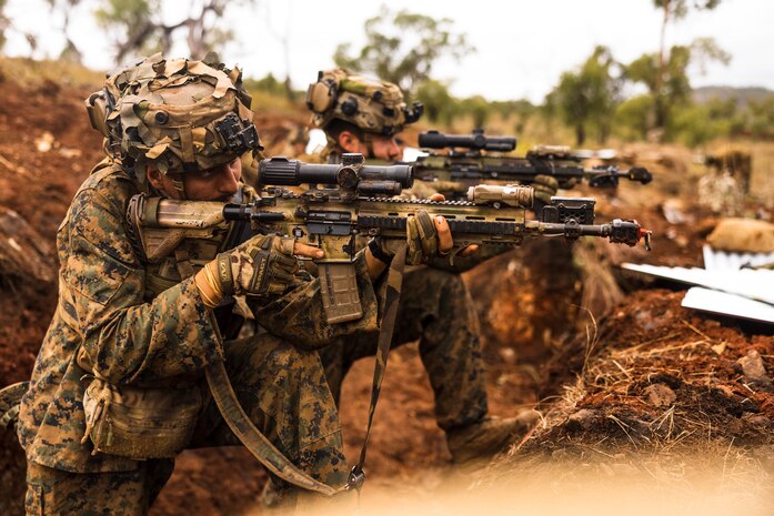 U.S. Marines with Lima Co., 3rd Battalion, 1st Marine Regiment, Marine Rotational Force – Darwin 23 engage simulated targets during Exercise Southern Jackaroo 23 in Townsville Field Training Area, Queensland, Australia, July 1, 2023. Southern Jackaroo is a trilateral exercise with MRF-D, Japanese Ground Self-Defense Force, and Australian Defence Force, with Republic of Korea observers, working together to achieve fire, maneuver, and communications interoperability objectives.