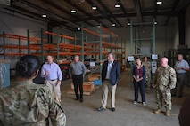 Airmen from the 5th Logistics Readiness Squadron give a briefing to Brad Bunn, Vice Director of the Defense Logistics Agency at Minot Air Force Base, North Dakota, July 18, 2023. LRS conducts operations ranging from material management, fuel, deployment and distribution to vehicle management. LRS utilizes DLA to ship these items to Minot so our Airmen can get the mission done. (Air Force photo by Senior Airman Caleb S. Kimmell)