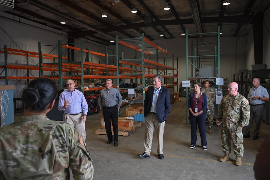 Airmen from the 5th Logistics Readiness Squadron give a briefing to Brad Bunn, Vice Director of the Defense Logistics Agency at Minot Air Force Base, North Dakota, July 18, 2023. LRS conducts operations ranging from material management, fuel, deployment and distribution to vehicle management. LRS utilizes DLA to ship these items to Minot so our Airmen can get the mission done. (Air Force photo by Senior Airman Caleb S. Kimmell)