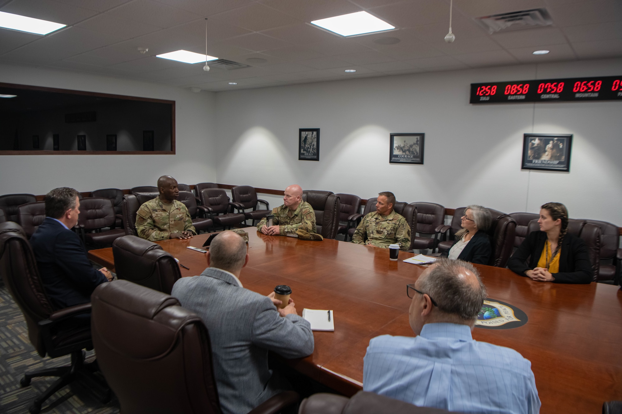 Leadership from the Defense Logistics Agency in Virginia receives a briefing by Col. Kenneth McGhee, 91st Missile Wing commander and Chief Master Sgt. Ernest Crider, 91st MW command chief at Minot Air Force Base, North Dakota, July 19, 2023. DLA is the Defense Department’s combat support agency for worldwide logistics, which provides food, medical material, uniforms and construction equipment. (U.S. Air Force photo by Airman 1st Class Kyle Wilson)
