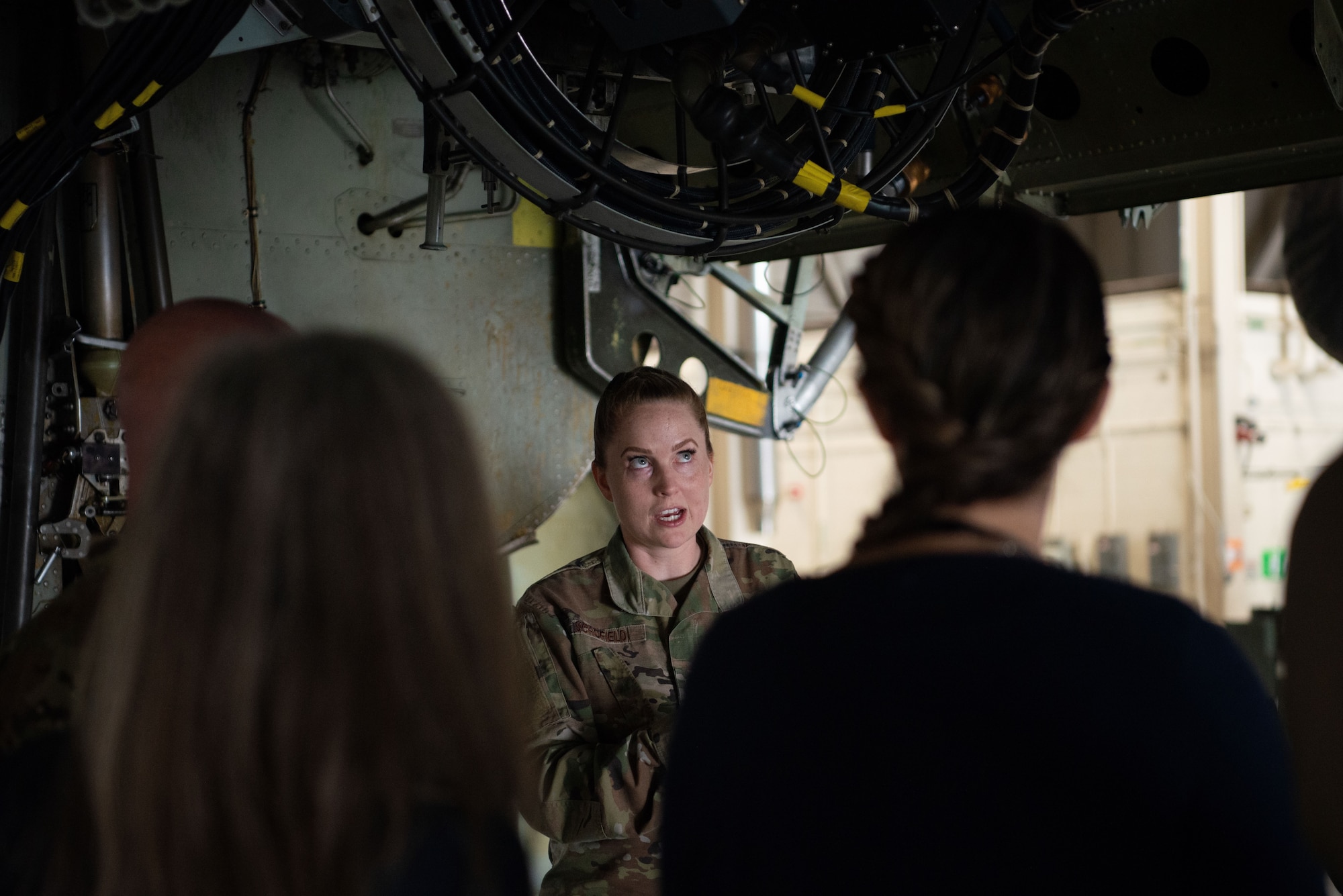 U.S Air Force Master Sgt. Shelley Schofield, 5th Maintenance Group weapon standardization superintendent, gives a tour of a B52-H Stratofortress to the Defense Logistics Agency at Minot Air Force Base, North Dakota, July 18, 2023. DLA is the Department of Defense’s combat support agency for worldwide logistics, which provides food, medical material, uniforms and construction equipment. (Air Force photo by Airman 1st Class Alyssa Bankston)