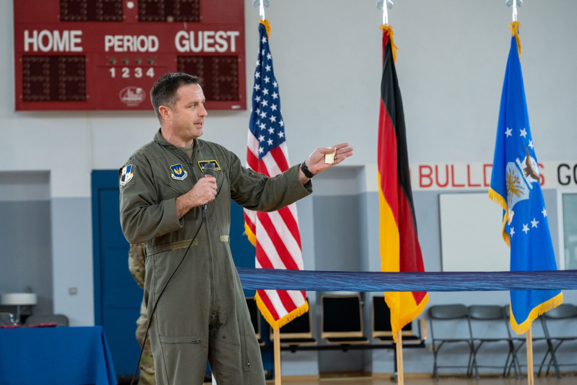 U.S. Air Force Col. Kevin Crofton, 52nd Fighter Wing commander, gives a speech during the Community Commons ribbon-cutting ceremony at Spangdahlem Air Base, Germany, July 21, 2023.
