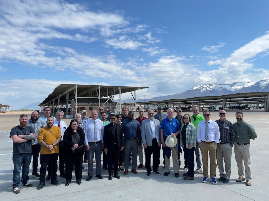 group of people standing on flight line