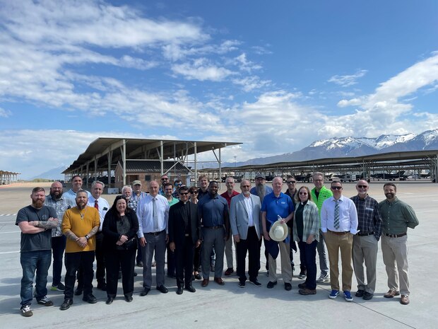 group of people standing on flight line