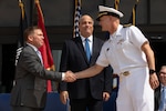 Captain Todd Weeks, relieves Mr. Michael D. McClatchey as Program Executive Office Undersea Warfare Systems (PEO UWS) during a Change of Office ceremony at the Washington Navy Yard, July 21.