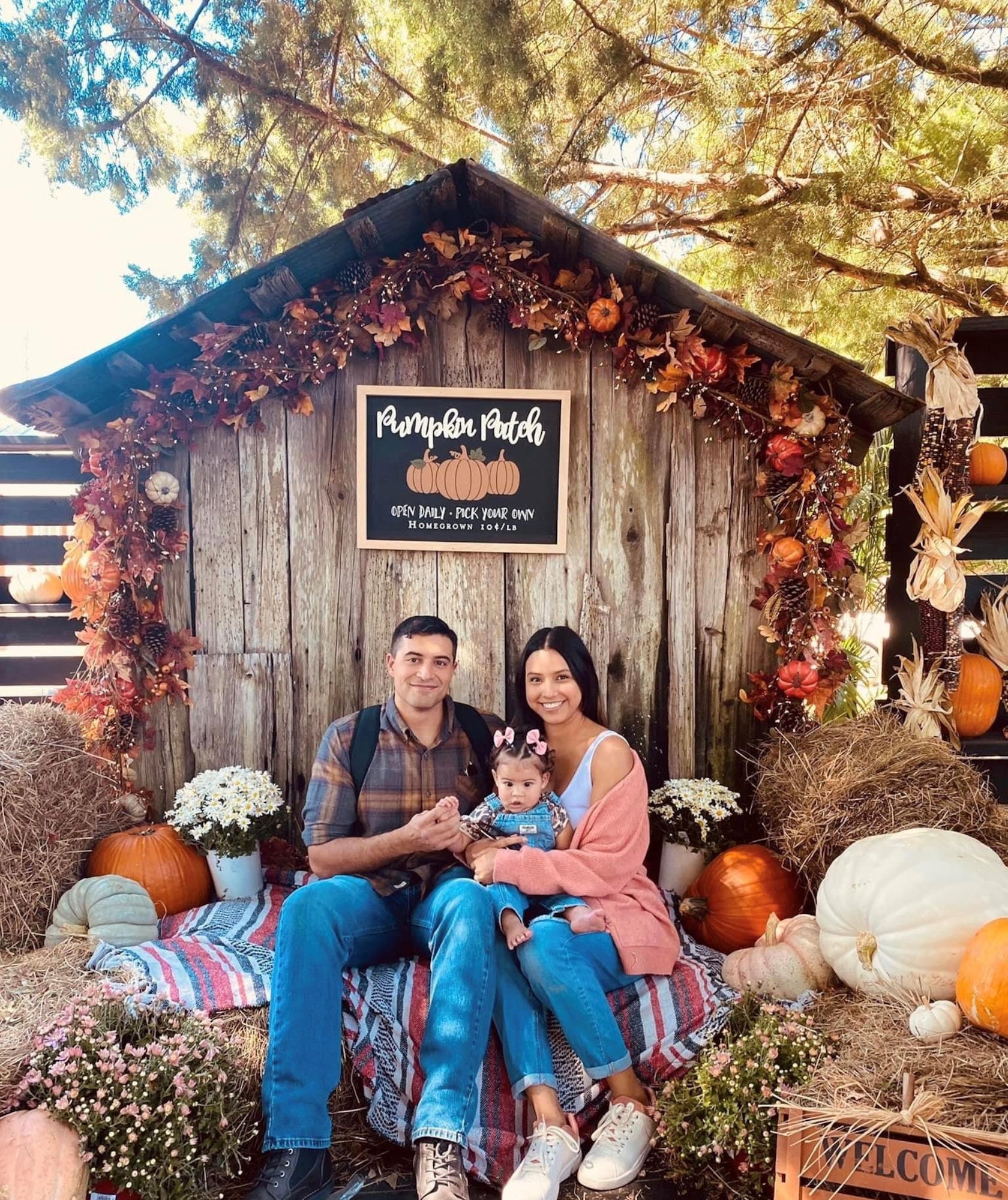 Senior Airman Ashley Camacho Della Rosa, right, 325th Fighter Wing paralegal, Senior Airman Thomas Della Rosa, left, and Alina Della Rosa, pose for a family photo at Tyndall Air Force Base, Florida, Oct. 1, 2022. Ashley met Thomas in technical school and maintained a long-distance relationship at different bases before getting married and starting a family. (Courtesy photo)