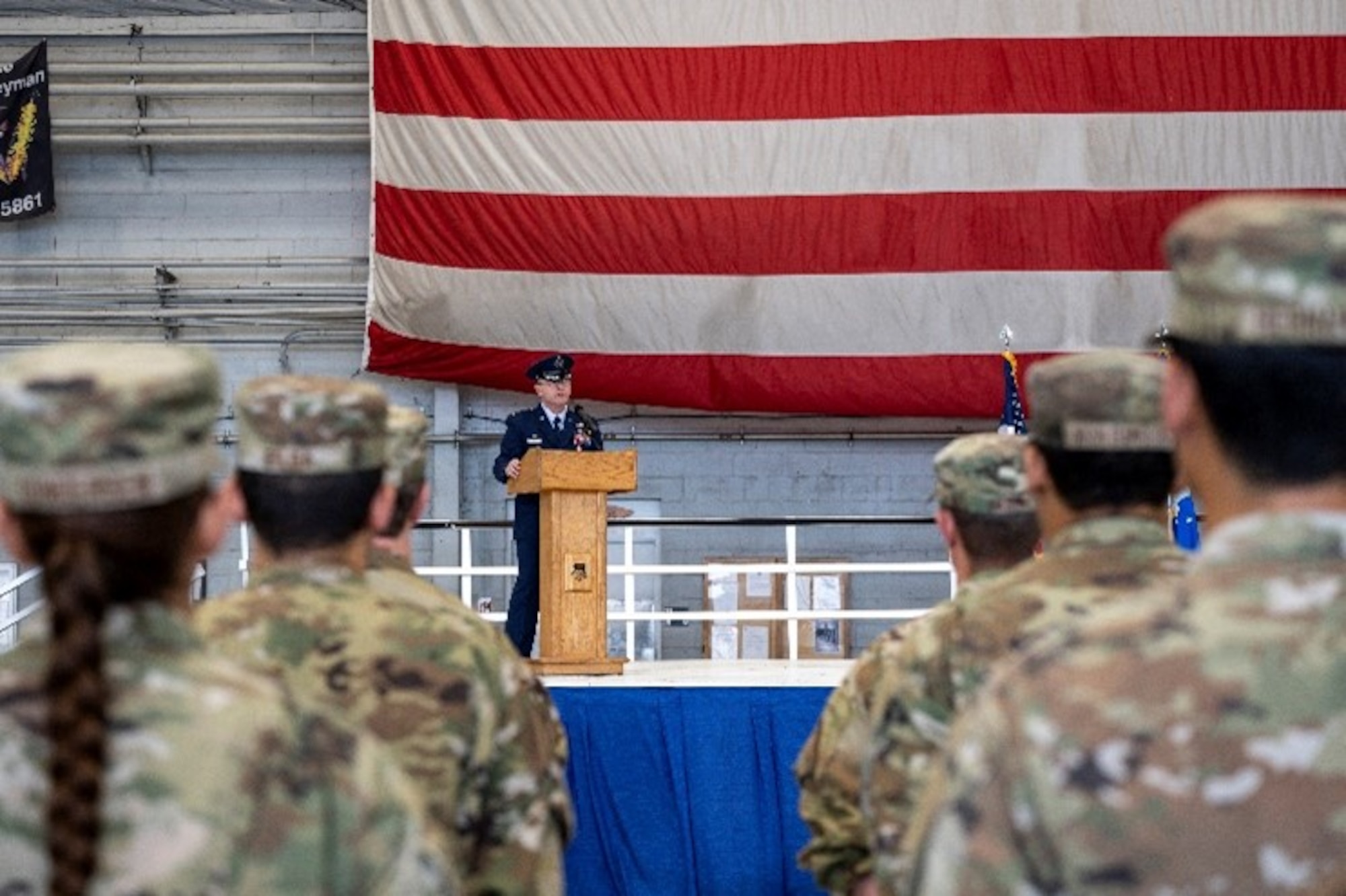 Colonel Brian Helton, outgoing 492d Special Operations Training Group commander, shares parting remarks during a change of command ceremony, July 14, 2023, at Hurlburt Field, Florida.