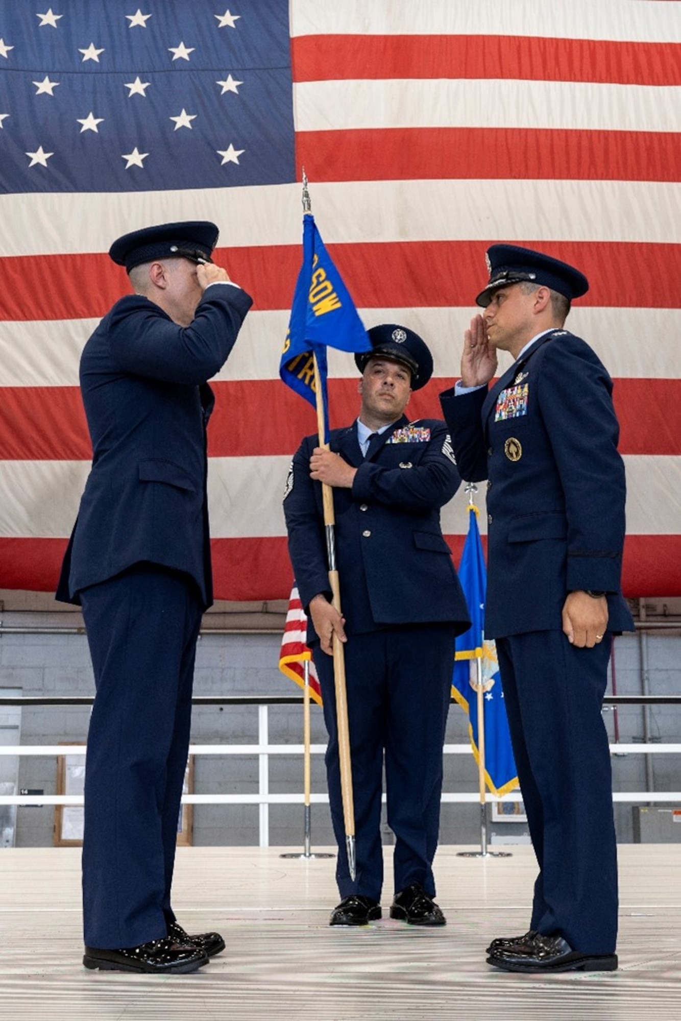 Colonel Robert Johnston (right), incoming 492d Special Operations Training Group commander, salutes Colonel Caleb Nimmo (left), 492d Special Operations Wing commander, as he takes command of the 492d SOTRG and the Air Commando Development Center-Provisional, ACDC-P, July 14, 2023, at Hurlburt Field, Florida.