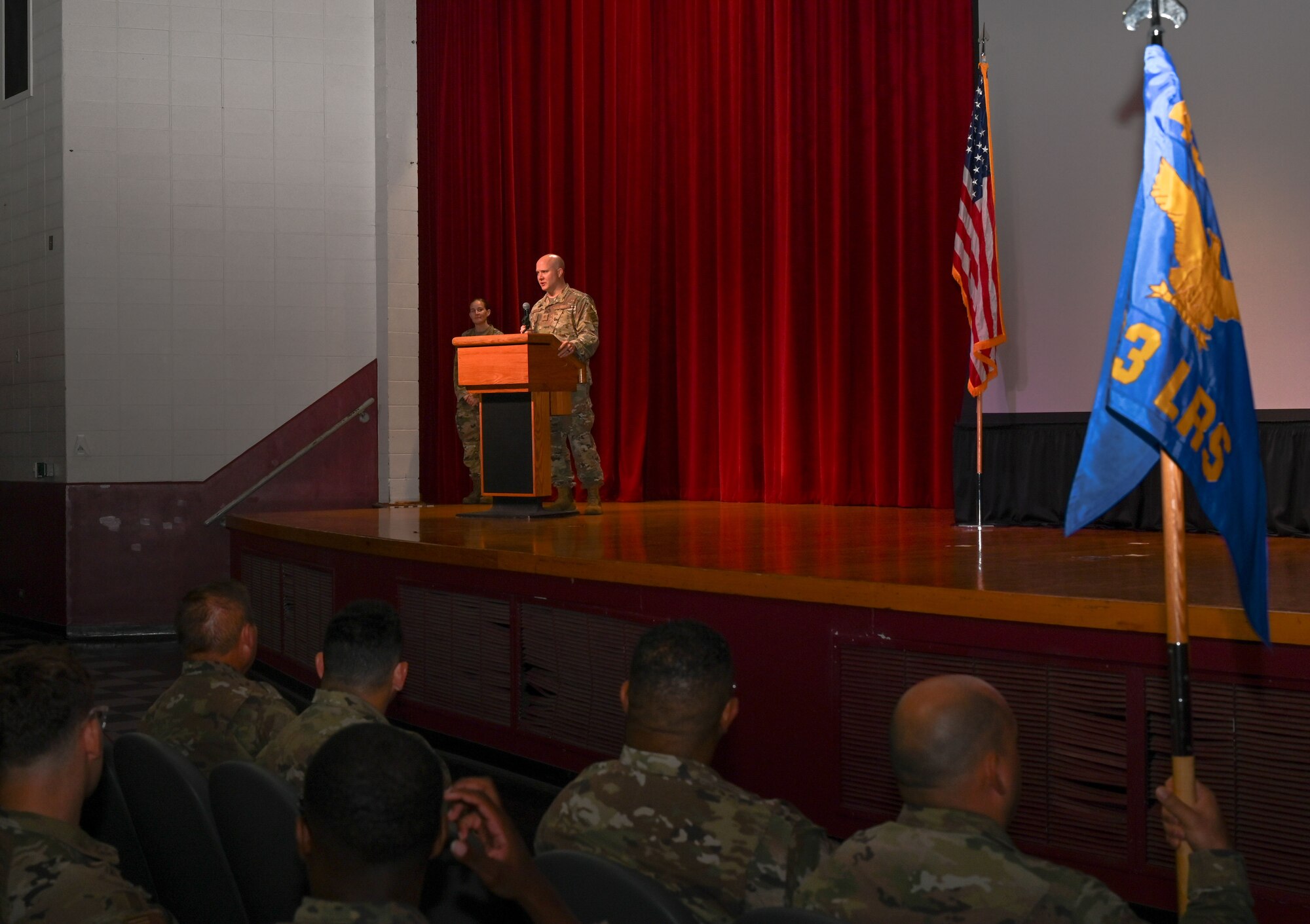 Maj. Jeffrey Barney speaks during an assumption of command ceremony at Joint Base San Antonio-Lackland, Texas, July 9, 2023, where he assumed command of the 433rd Logistic Readiness Squadron. The 433rd LRS's mission is to provide the logistical support necessary for the Alamo Wing to complete its assigned missions. (U.S. Air Force photo by Staff Sgt. Adriana Barrientos)