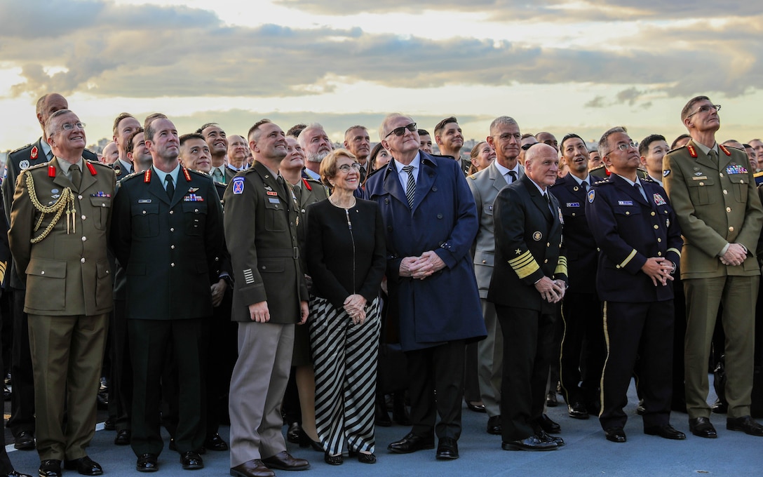 Senior leaders from various countries attend the opening ceremony of Talisman Sabre 2023 aboard the HMAS Canberra in Sydney Australia, July, 21, 2023. Talisman Sabre is a large-scale, bilateral military exercise between Australia and the United States, which strengthens relationships and interoperability among key allies and enhances collective capabilities to respond to a wide array of potential security concerns. This exercise will be the tenth iteration of the exercise. (US Army National Guard photo by Sgt. First Class Alexa Brumfield)